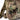 Multicam waist strap buckle detail with adjustable webbing and seam stitching