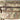Camo concealment pouch close-up with front zipper, webbing trim, and logo text