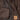 Brown leather jacket detail with visible zipper and patch pocket on lining