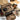 Desert camo pistol range bag with interior organizers, mesh pouch, and zip compartments