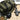 Olive-green range bag with wide carry strap and front zipper pocket, shown with gear items