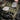 Multicam arid mini pistol range bag open with mesh-lidded panels and pouches