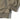 Tan flight jacket sleeve cuff and front zipper placket detail.
