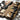 Open desert camo rifle bag with padded slots for rifles and gear compartments
