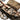 Open desert camo rifle bag with mesh cover and interior gear pouches