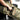 Multicam single rifle case close-up, padded end pocket and side carry strap.