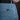 Blue denim jeans with branded tab, rivet details, and pocket stitching