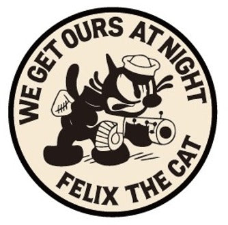 Round fabric patch with Felix the Cat and the text “WE GET OURS AT NIGHT”