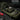 Single rifle case in dark olive with mesh top pocket, zip closure, and organizer rails
