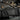 Black double rifle case laid open with interior mesh pocket and adjustable straps
