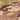 Multicam tactical face mask fabric close-up, perforated mesh with camo pattern