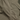 Olive tactical shirt fabric close-up with textured weave and zipper track seam