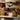 Wall-mounted screwdriver rack system with hanging tools on multiple rails and bins