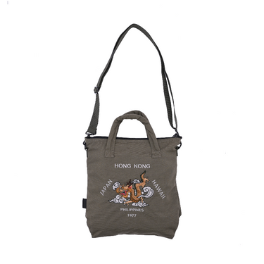 Olive shoulder tote with top carry handle and embroidered dragon graphic