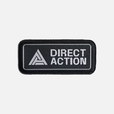 Embroidered tactical patch, black, Direct Action text with triangle logo