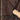 Brown leather bomber jacket shoulder and zipper detail with tan shearling trim