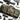 Woodland camouflage double rifle bag with front organizer panel and MOLLE webbing
