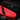 Red rifle case shell close-up with textured, water-beaded finish
