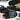 Hard shell rifle case open with black textured padding and rifle inside