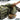 Olive tactical ammo carrier with zip compartments and attached tan mini loose sac pouch