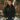 Goatskin flight jacket with shearling-style collar and front zipper worn outdoors