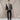 Sheepskin bomber jacket with tan shearling-lined collar and dark leather body on model
