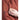 Maroon anorak jacket with half-zip front and hood, visible zipper pull