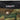 Combat tactical pants waistband with MILES patch and green-brown camo fabric
