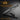UZI tactical glassbreaker pen with textured grip and carbide striking tip, metal body