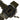 Tactical helmet accessory platform with MOLLE straps and front panel, dark green