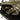 Olive plate carrier with padded front panel, MOLLE rows, and overflap strap