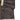 Brown leather sheepskin jacket close-up of zip pockets and cream shearling hem trim