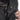 Black fleece jacket with zip chest pocket and camouflage inner panel
