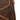 Brown Cordura pack with stitched fabric label on side panel