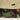 Camo cargo shorts with stitched patch label on the leg panel