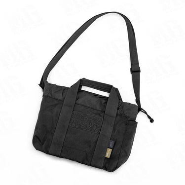 Ammo bucket in black fabric with shoulder strap and front panel pocket.