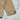 Olive drab smock jacket cuff with elastic and reinforced suede-like panel