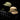 Pair of herringbone twill hats, olive and khaki, curved brims and gathered crowns.