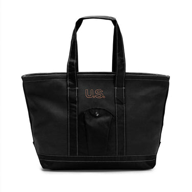 Black canvas tote bag with U.S. logo patch and front pocket, stitched handles