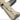 Dark earth airsoft electric rifle receiver close-up with charging handle and trigger area