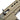 Dark earth airsoft electric rifle close-up of top receiver cover and ejection area