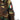 Woodland camouflage jacket sleeve with Italia shield patch and pocket flap.