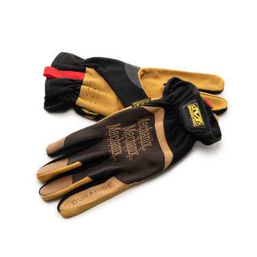 Pair of leather work gloves with black back, brown palms, and hook-and-loop wrist tab