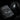 Tactical respirator with perforated face cover and black carry pouch with strap