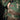 Woodland camouflage jacket with buttoned shoulder flap and side pocket