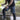 Dark cargo shorts with multiple pockets and belt loops