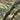 Camouflage waterproof parka front zipper and flap with snap buttons, seam detail