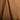 Brown perforated fabric texture detail on T-shirt