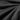 Black thermal pants fabric texture close-up.