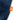 Dark blue fleece neck gaiter with orange square logo patch close-up.